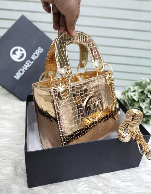 "Michael Kors – Luxe Shine, Timeless Glamour!"